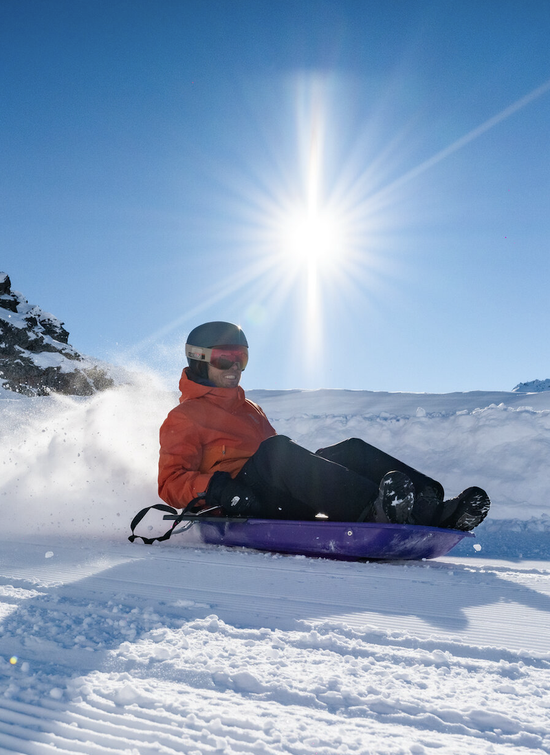 Sledging down Cosmojet in Val Thorens