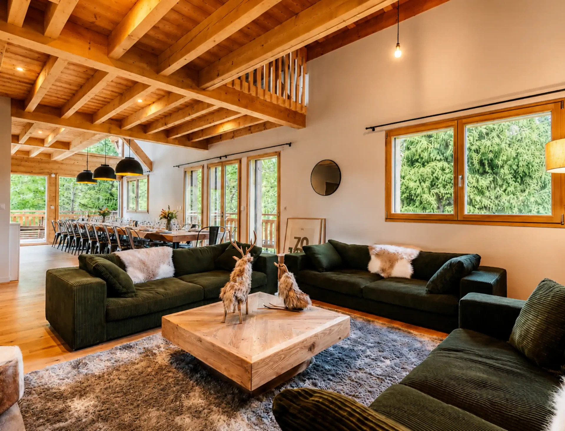 Open-plan chalet living room with timber beams