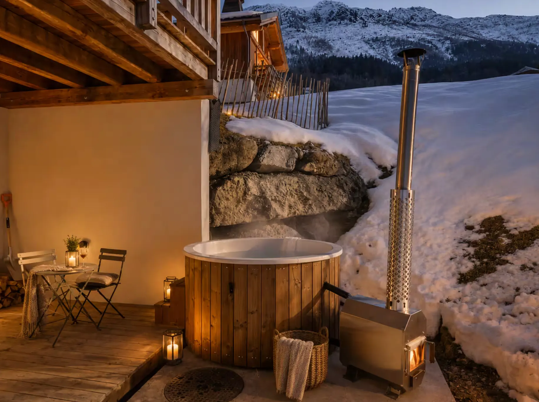 Outdoor hot tub at dusk with mountain views